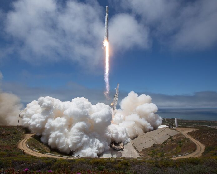 SpaceX Falcon 9 rocket lifting off from Vandenberg