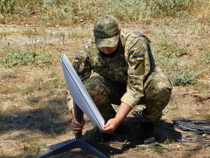 starlink-terminal-ukraine-support-forces A Ukrainian soldier installing a Starlink terminal